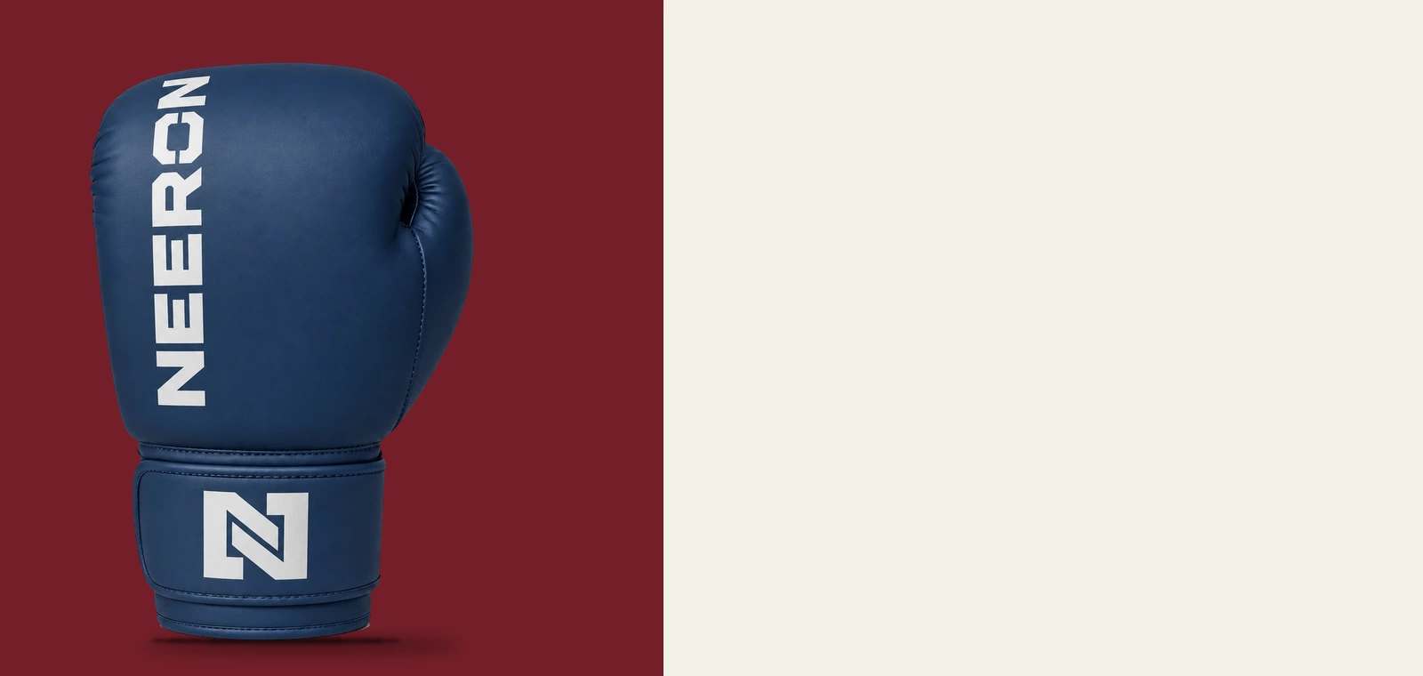 Navy NEERON boxing glove against dark crimson